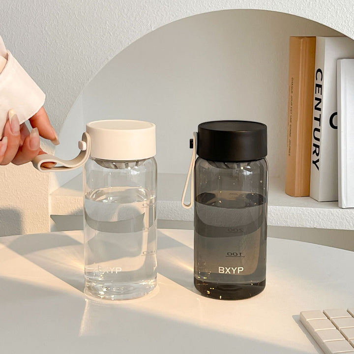 Women's BPA-free drinking bottle with smart lid from Kalsten