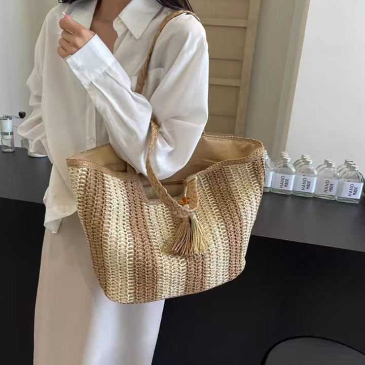 Beach bag with cheerful stripes and tassel details Kalsten
