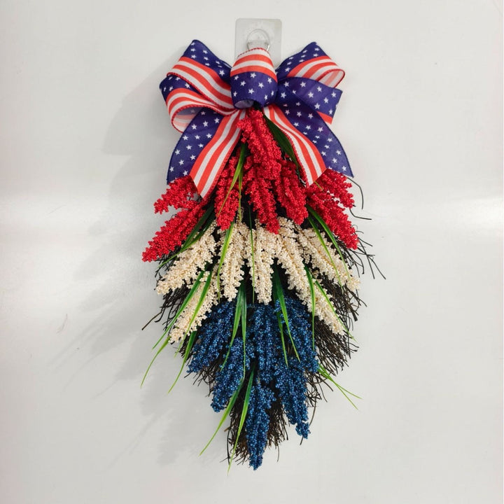 Independence Day tiered faux wildflower door swag with grosgrain stars-and-stripes bow Kalsten