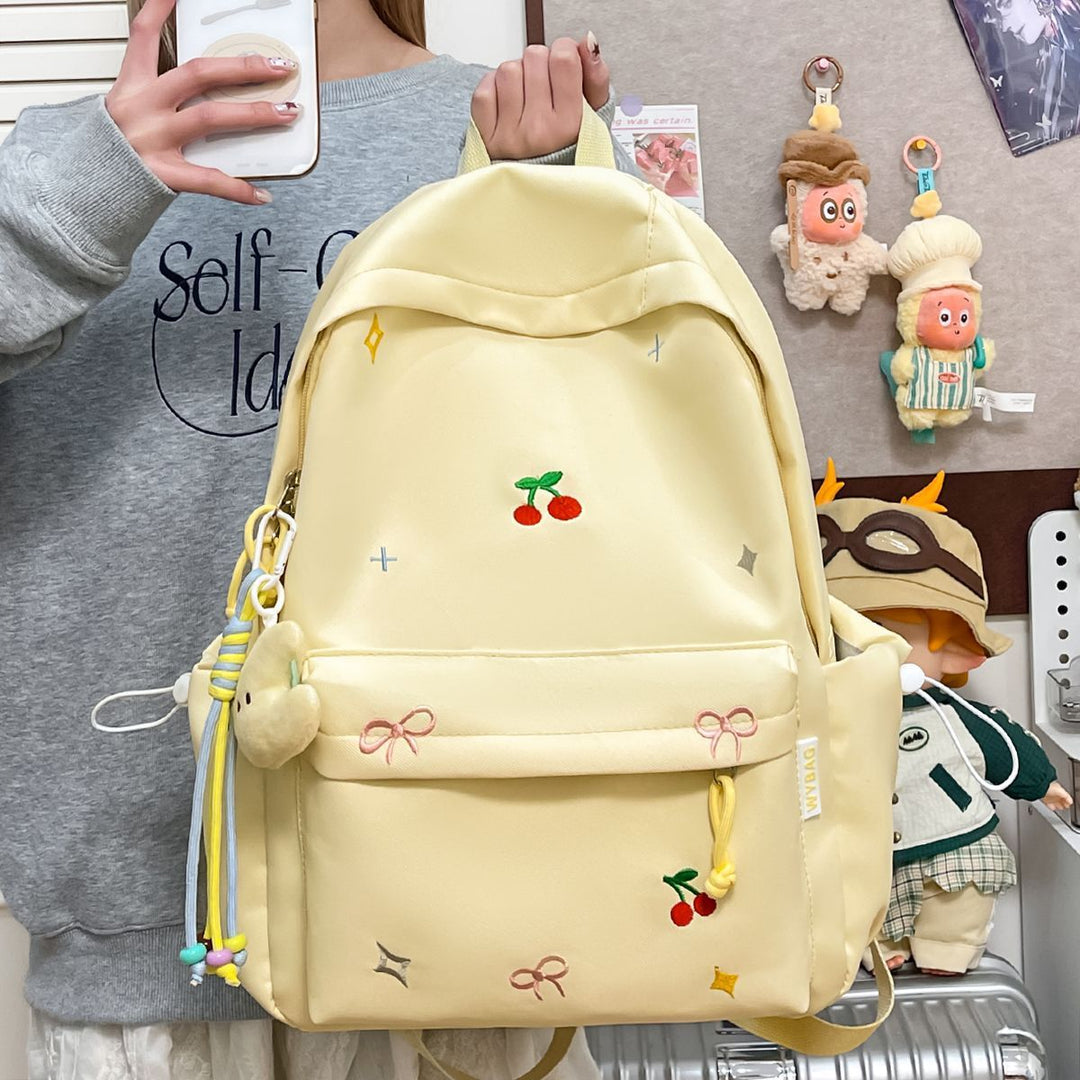 Playful backpack with embroidery Kalsten