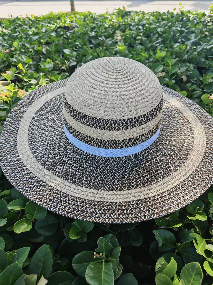 Elegant sun hat with wide brim and subtle stripe pattern Kalsten