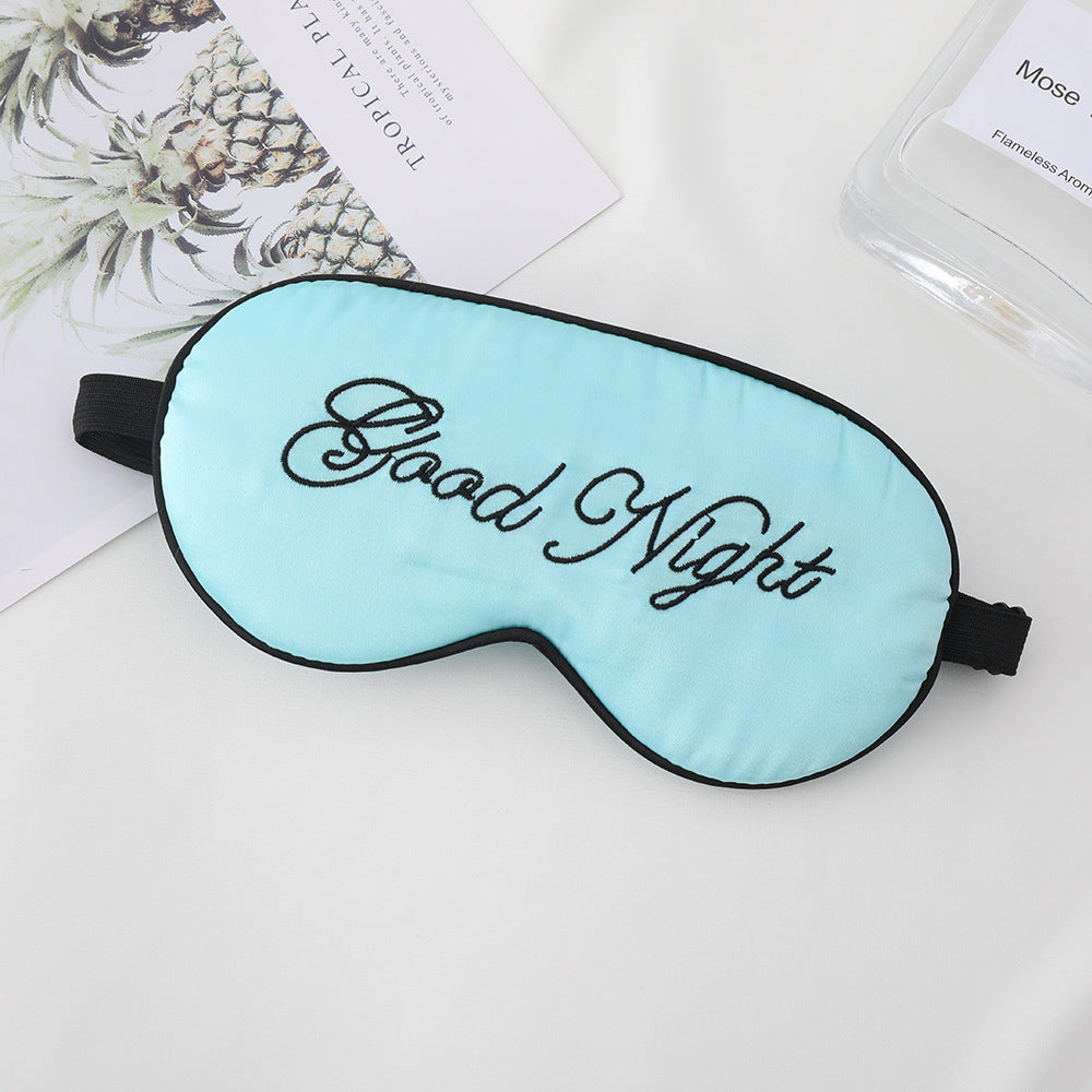Unisex embroidered contoured sleep mask with decorative text embroidery and adjustable elastic band Kalsten
