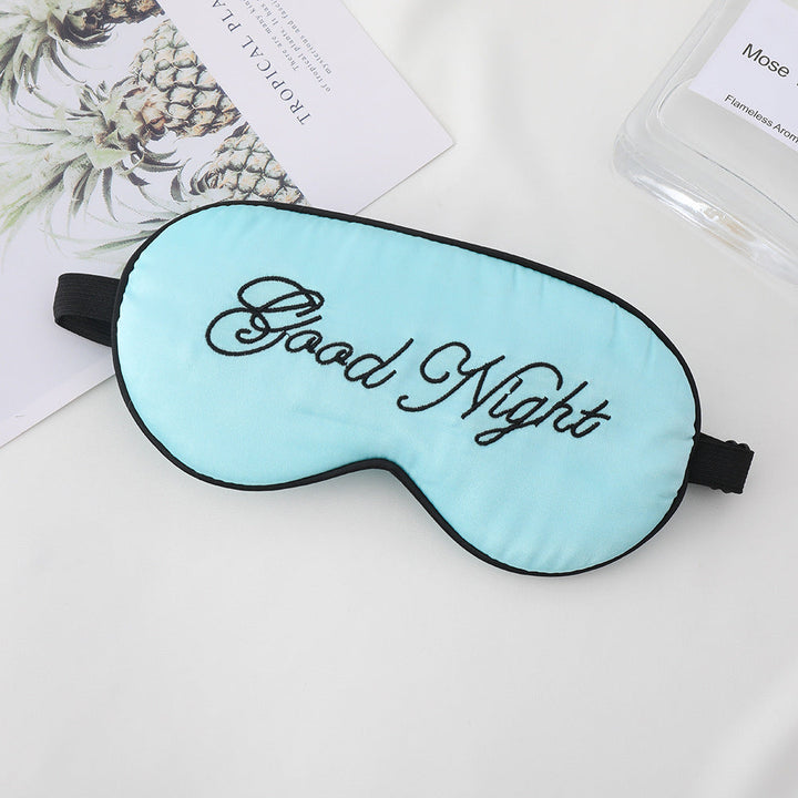 Unisex embroidered contoured sleep mask with decorative text embroidery and adjustable elastic band Kalsten