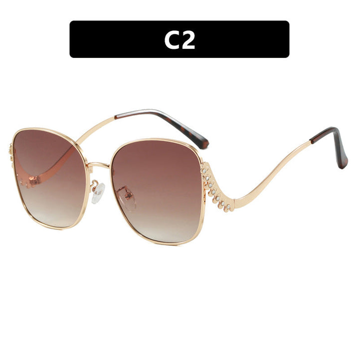 Women's striking sunglasses with sparkling appliqués Kalsten