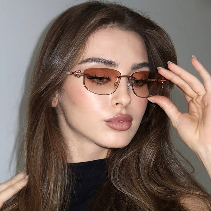 Ladies elegant semi-rimless glasses with luxurious metal frame and transparent lenses Kalsten