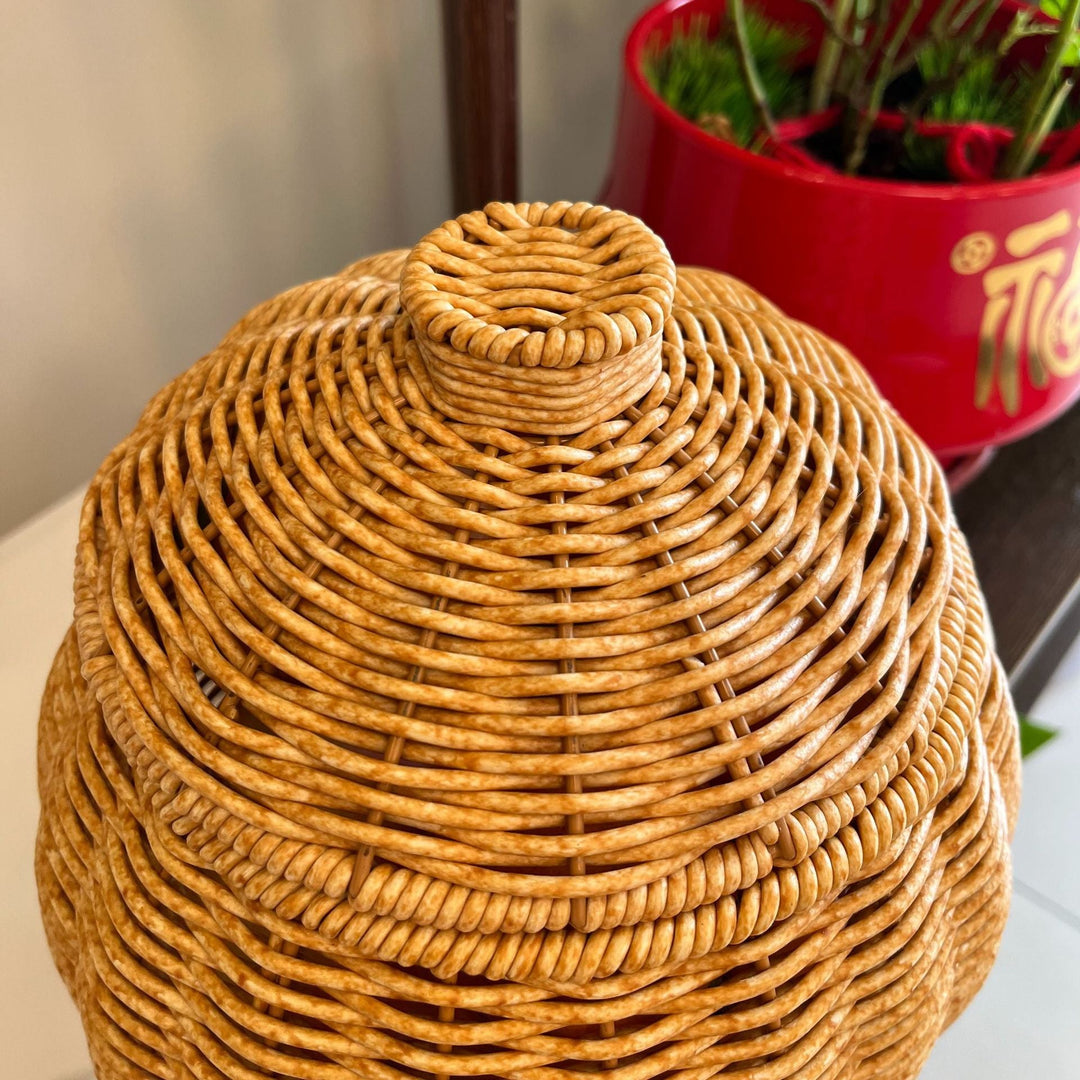 Women artfully woven storage pot Kalsten
