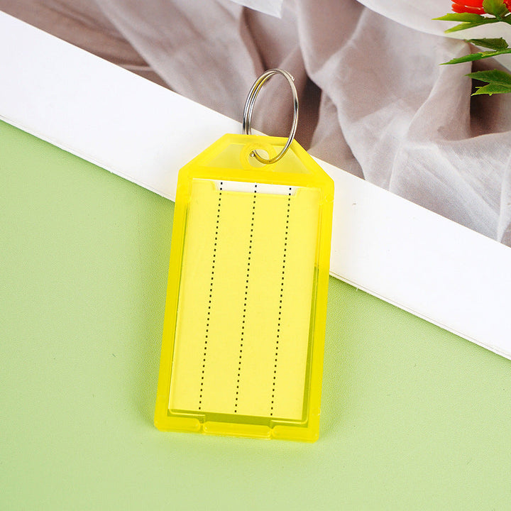 Unisex label tag with transparent sleeve and three writable fields Kalsten