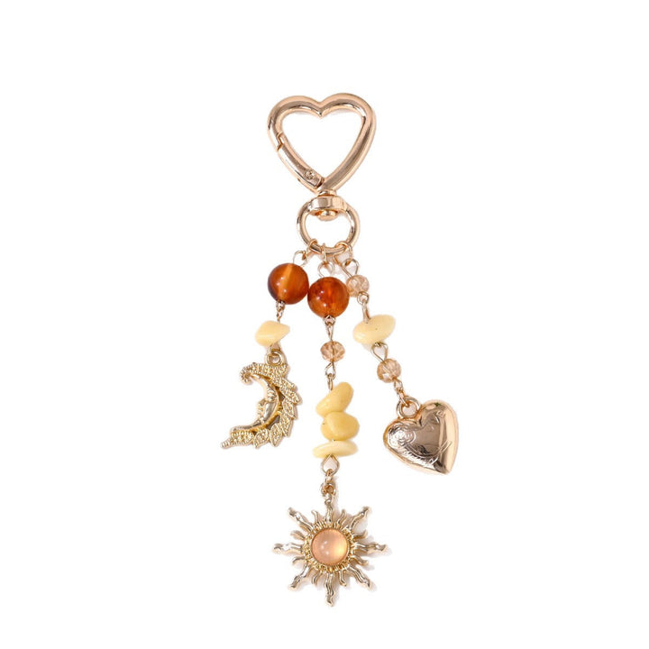 Keychain with Sparkling Sun Motif Kalsten