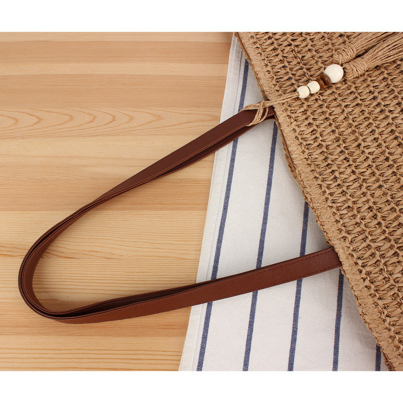 Handbag Made of Braided Natural Material with Tassel Decoration Kalsten
