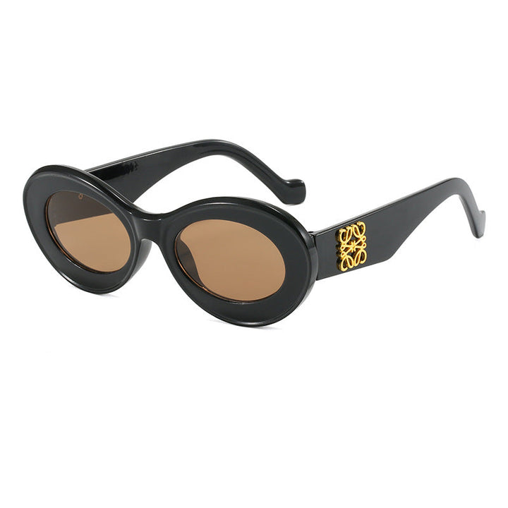 Women's fashionable sunglasses with oval frame and golden applications Kalsten