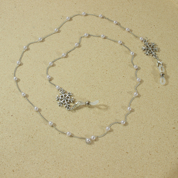 Elegant glasses holder chain with pearls and snowflake pendant Kalsten