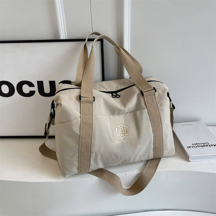 Sporty tote bag with multiple compartments and adjustable straps Kalsten