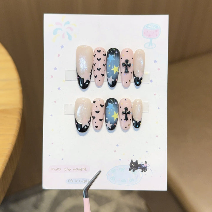 Artificial nail tips with playful star and heart designs Kalsten