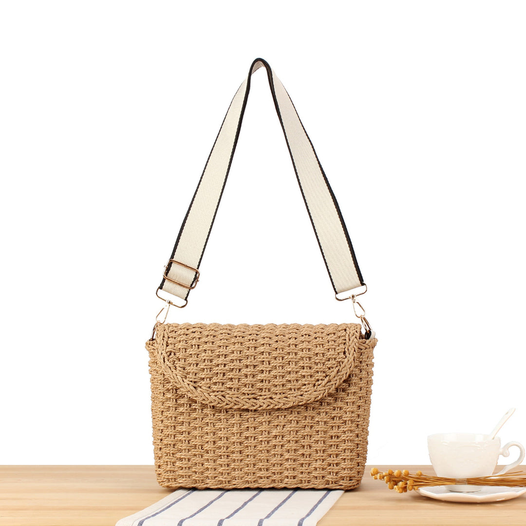 Handbag made of woven natural material with adjustable shoulder strap Kalsten
