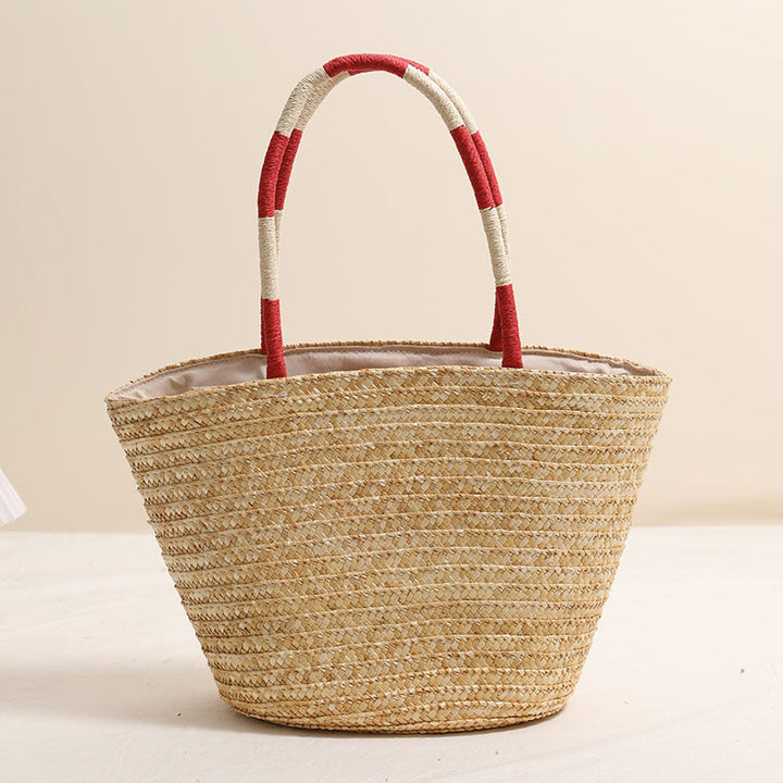 Handcrafted basket bag with vibrant floral embroidery design Kalsten