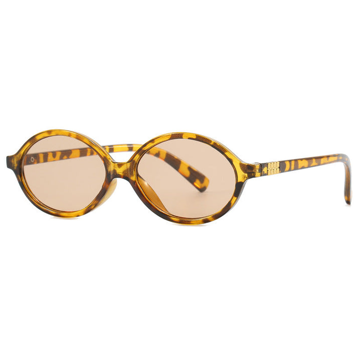Women's fashionable sunglasses with oval frame and golden accents Kalsten