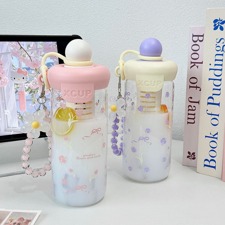 Women's bottle with integrated fruit infuser and Kalsten keychain