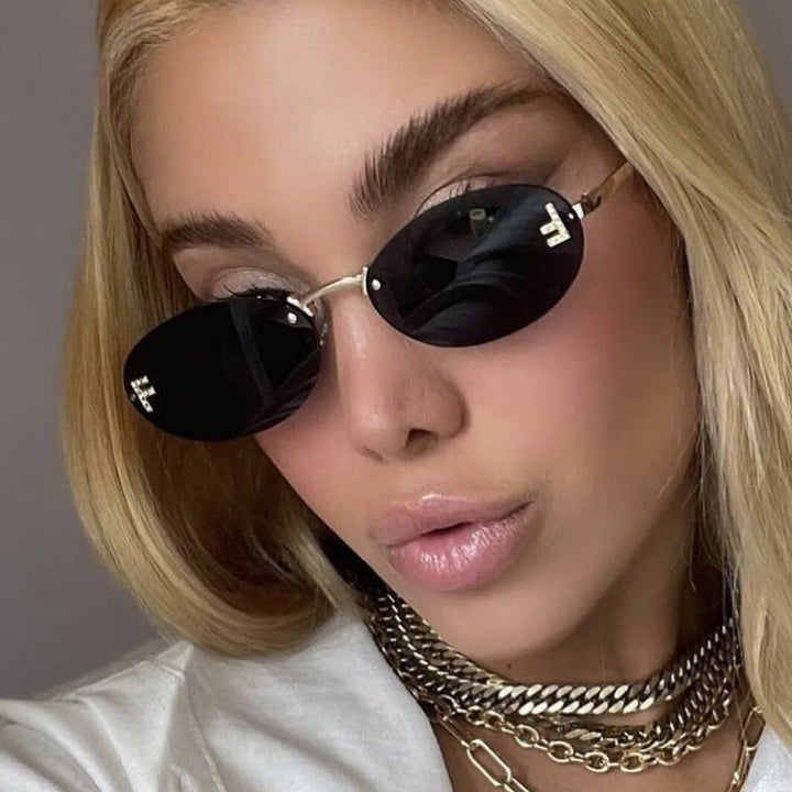 Women's fashionable sunglasses with elegant, round lenses and delicate metal frame Kalsten