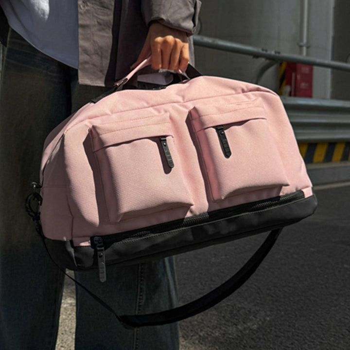 Sporty travel bag with two additional outer pockets Kalsten