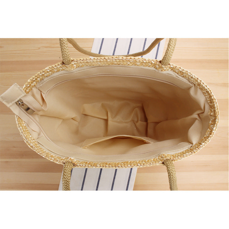 Handcrafted straw bag with long handles Kalsten