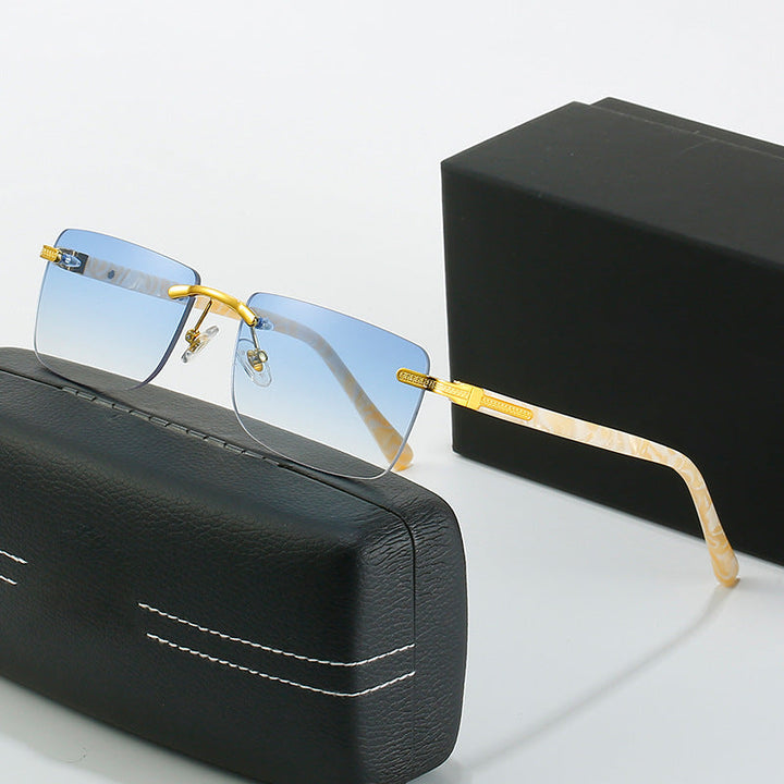 Women's fashionable sunglasses with a stylish, rectangular frame and elegant metal accents Kalsten