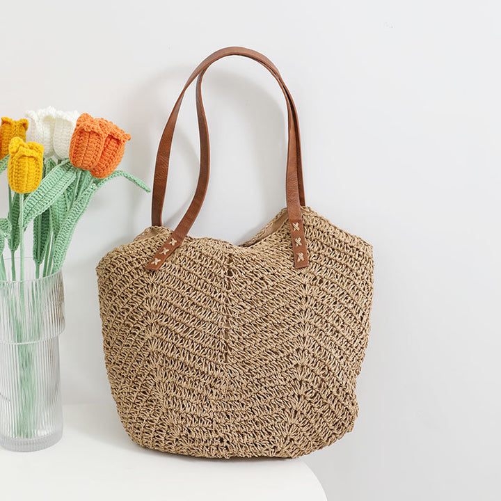 Braided basket bag with sturdy leather handles Kalsten