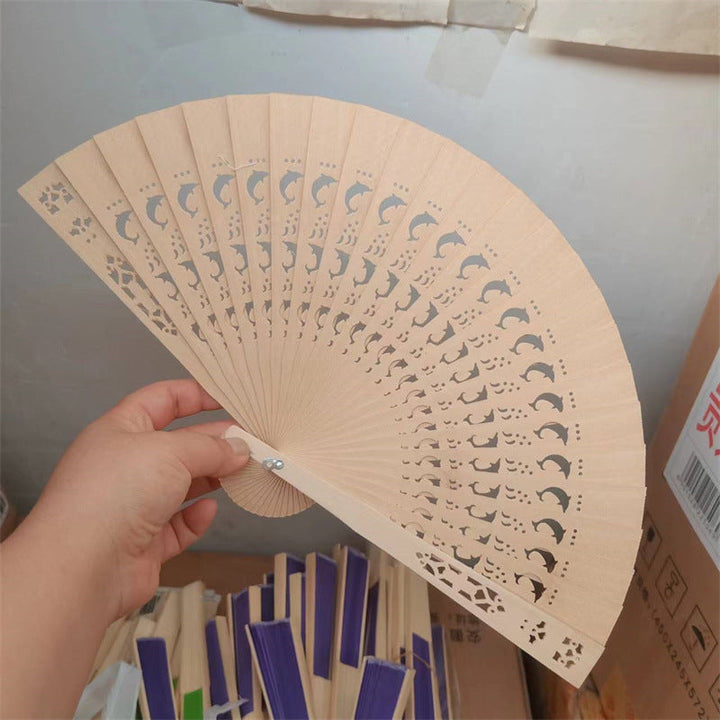 Ladies decorative and high-quality hand fan made of filigree wood Kalsten