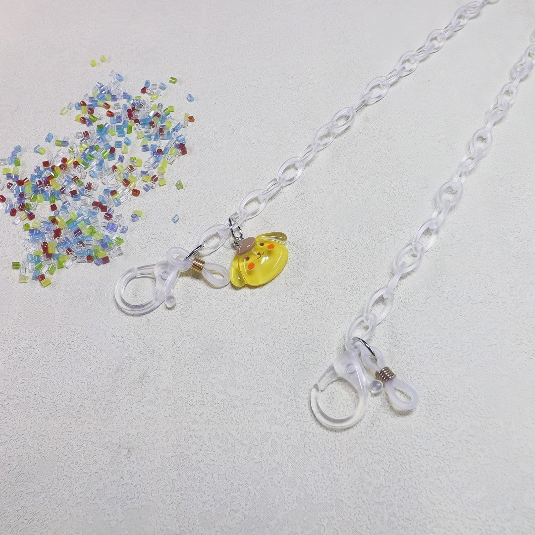 Playful glasses holder chain made of transparent material Kalsten