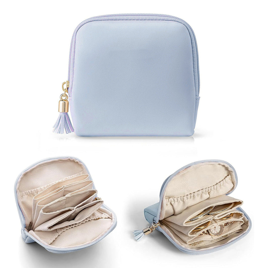 Cosmetic organizer with structured interior and elegant tassel Kalsten