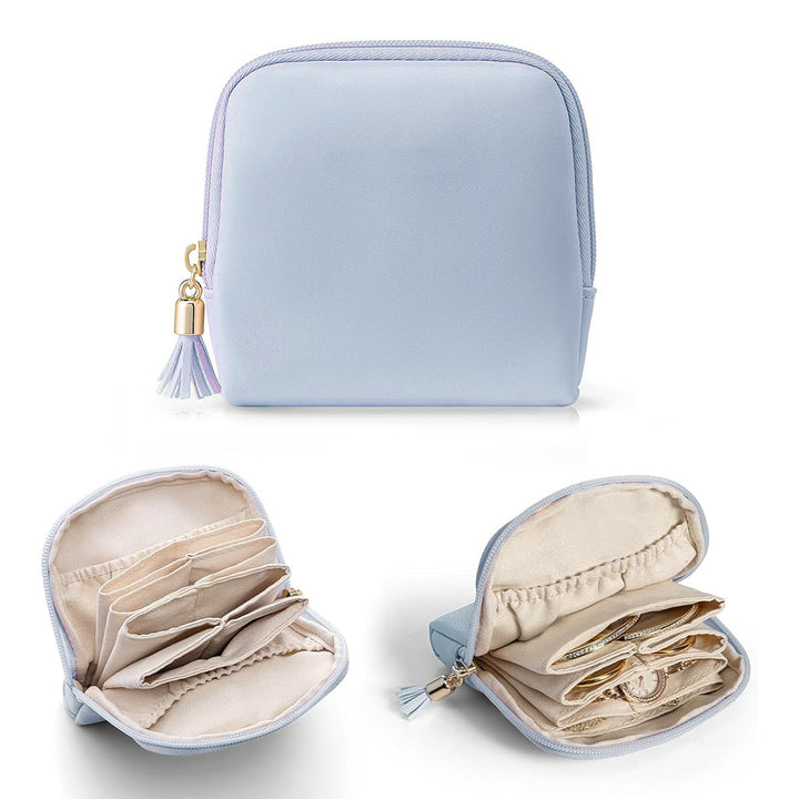 Cosmetic organizer with structured interior and elegant tassel Kalsten