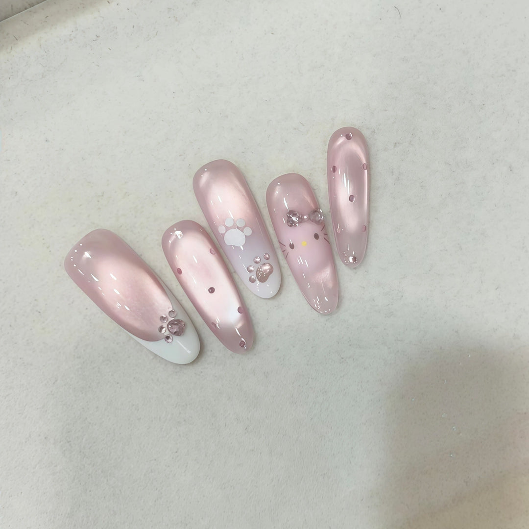 Artificial nail tips with playful penguin and paw print design Kalsten