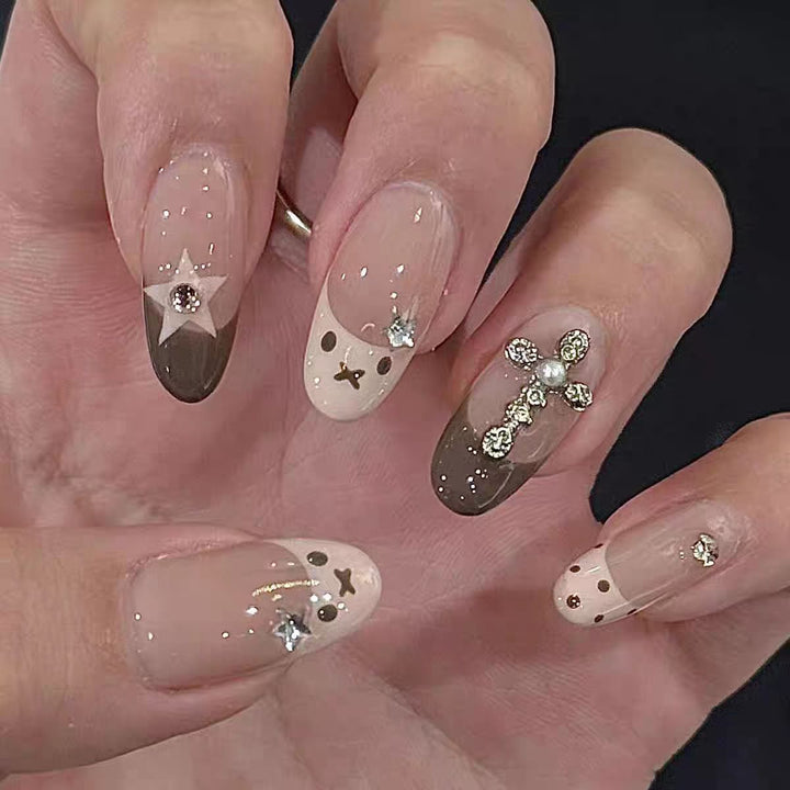 Artificial nails with creative design and sparkling accents Kalsten