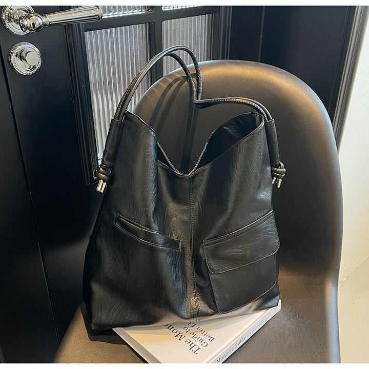 Casual tote bag with practical front pockets Kalsten