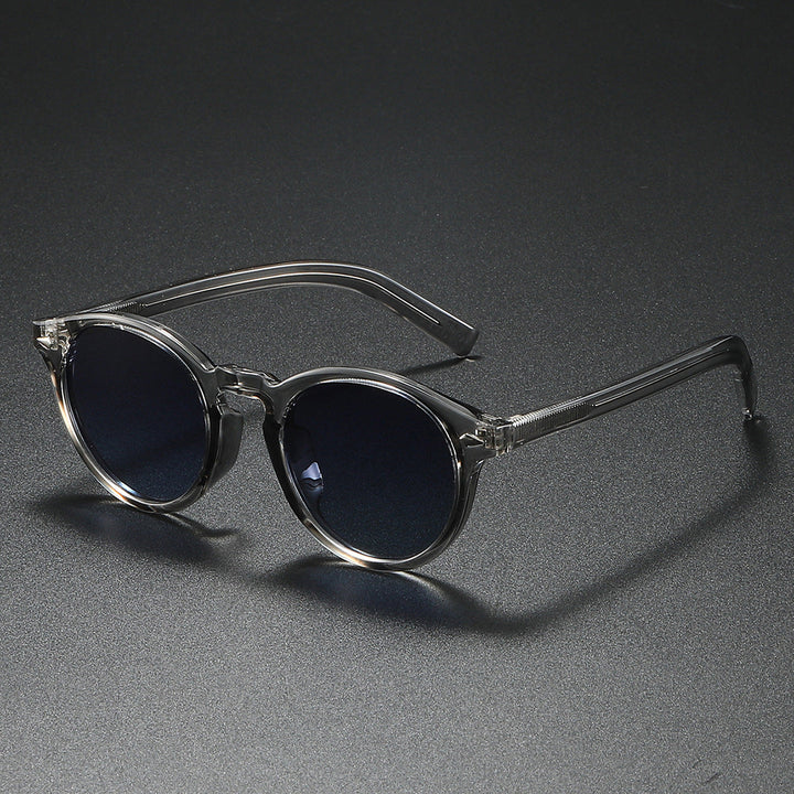 Ladies Round Sunglasses with Transparent Frame and Reflective Lenses Kalsten