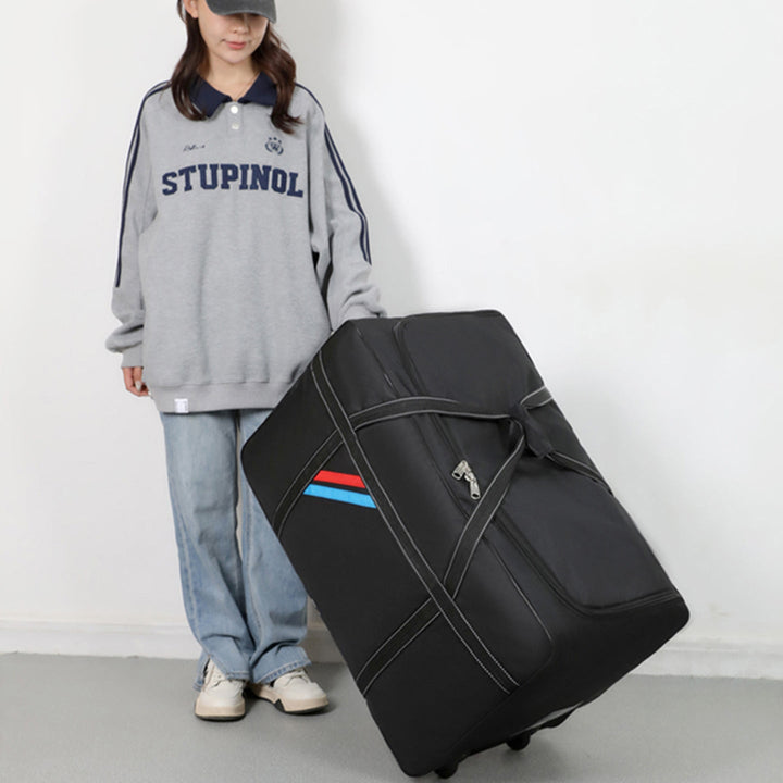 Spacious travel bag with lightweight wheels and reinforced carrying handle Kalsten