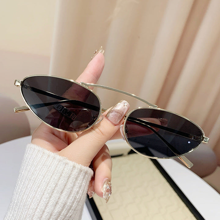 Ladies fashionable sunglasses in elegant oval design Kalsten