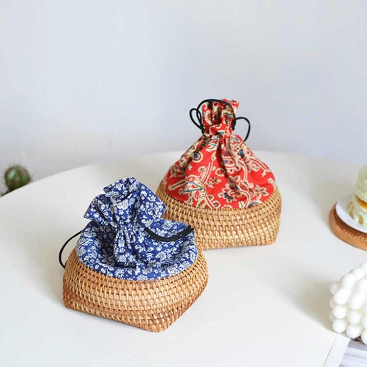Charming storage bag made of hand-woven rattan Acalora