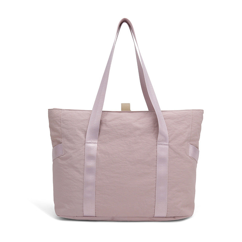 Stylish tote bag with spacious main compartment and reinforced handles Kalsten