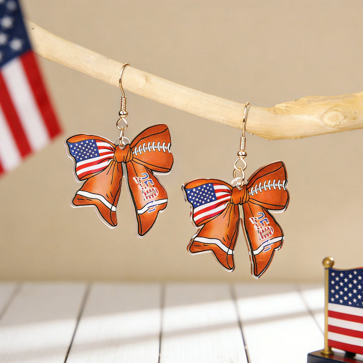 Ladies nan statement earrings with bow shape and American flag pendant Kalsten