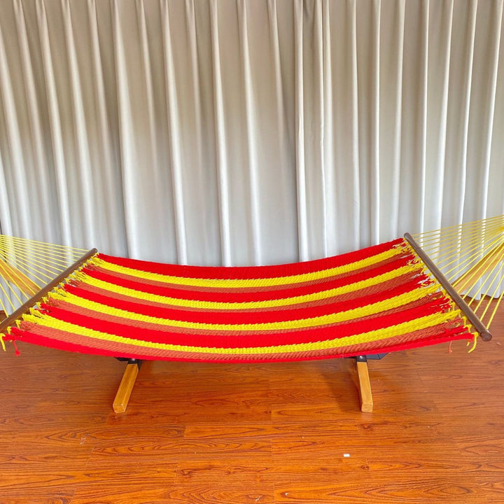 Woven cotton hammock with wooden spreader bars and freestanding stand Kalsten