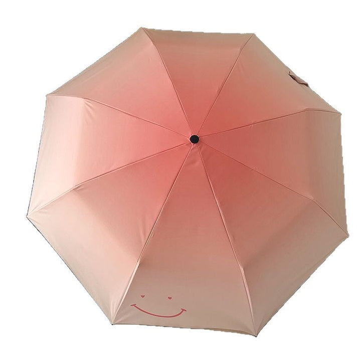 Women's foldable umbrella with playful design and handy wooden handle Kalsten