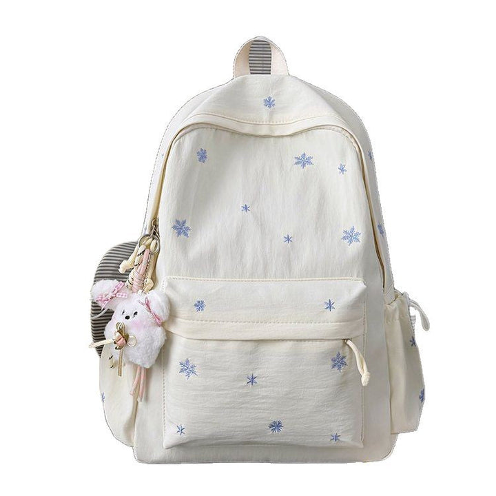 Playful backpack with fine embroidery Kalsten