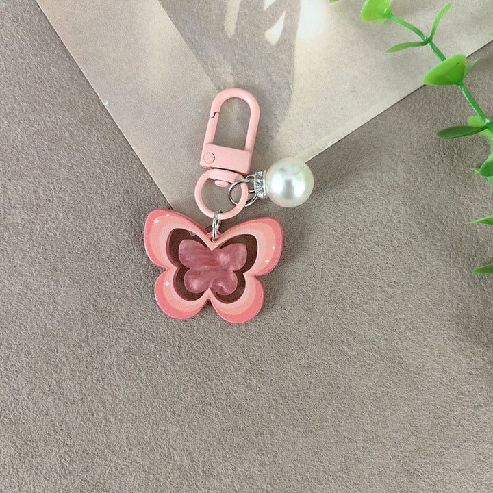Keychain with butterfly and pearl accent Kalsten