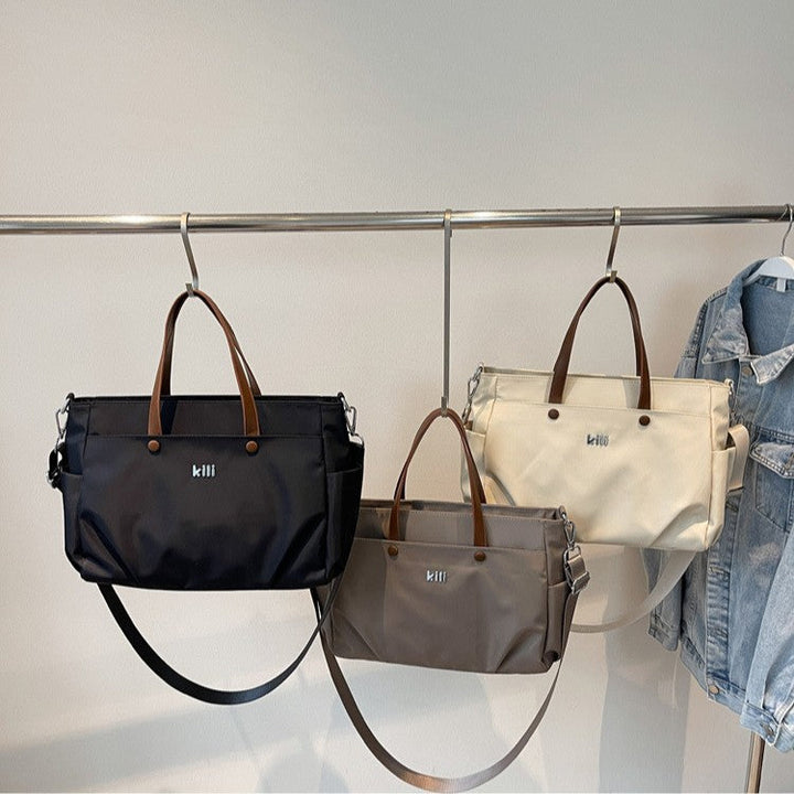 Shopping bag with comfortable carrying system and practical outer pockets Kalsten