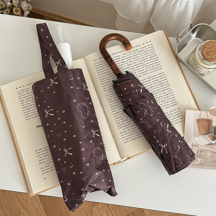 Women's folding umbrella with elegant pendant design Kalsten