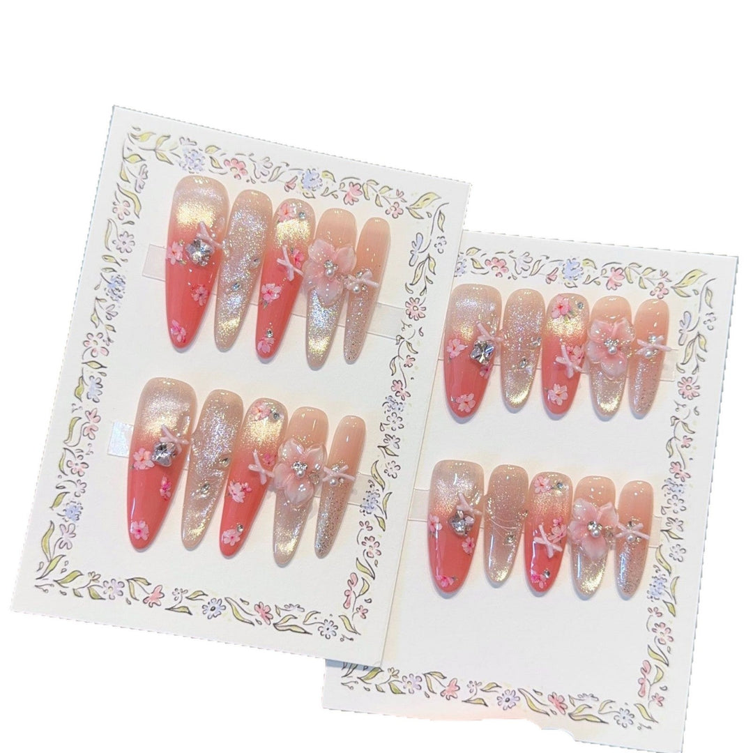 Artificial nails with floral embellishments and glitter effects Kalsten