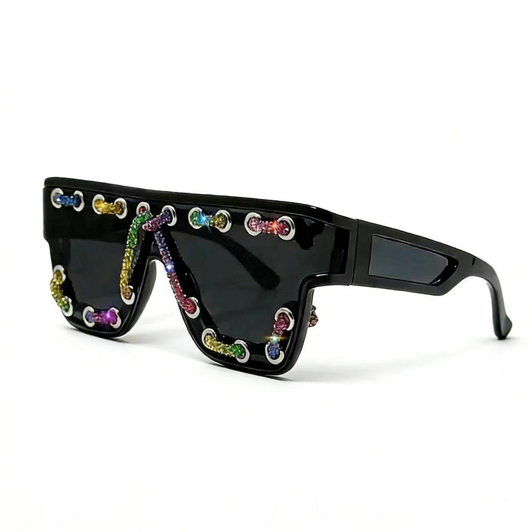Ladies sunglasses with extravagant design and decorative chain embellishment Kalsten
