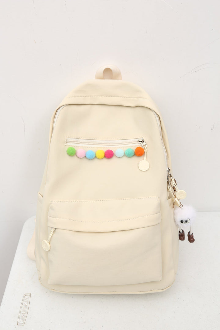 Practical backpack with colorful applications Kalsten
