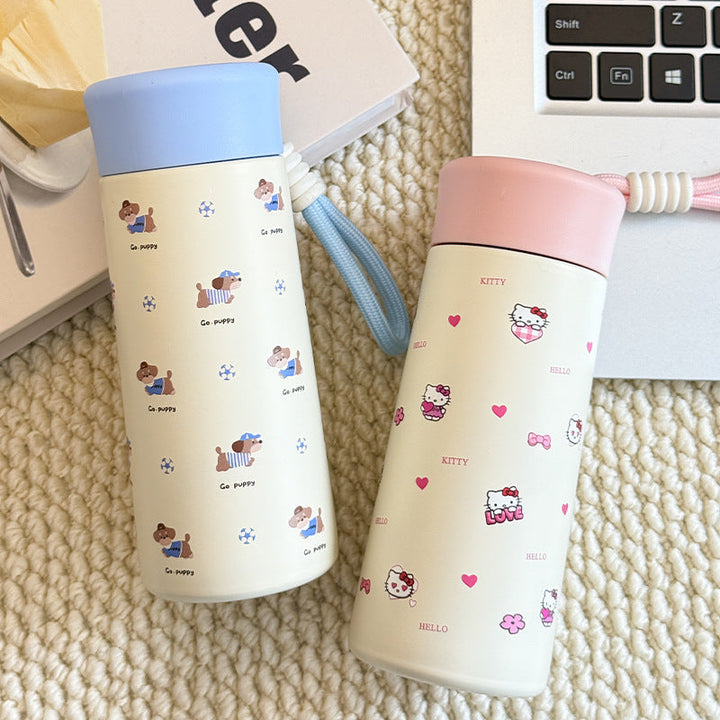 Women’s insulated drinking bottle with practical carrying strap and playful design Kalsten