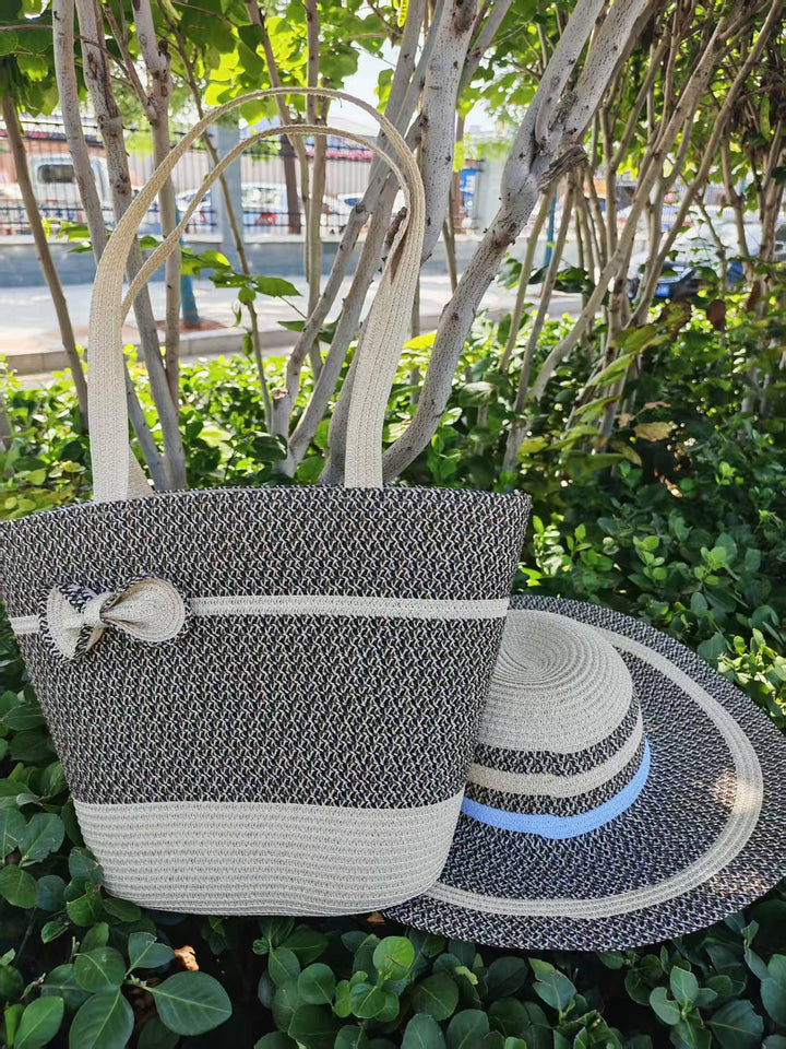 Elegant sun hat with wide brim and subtle stripe pattern Kalsten